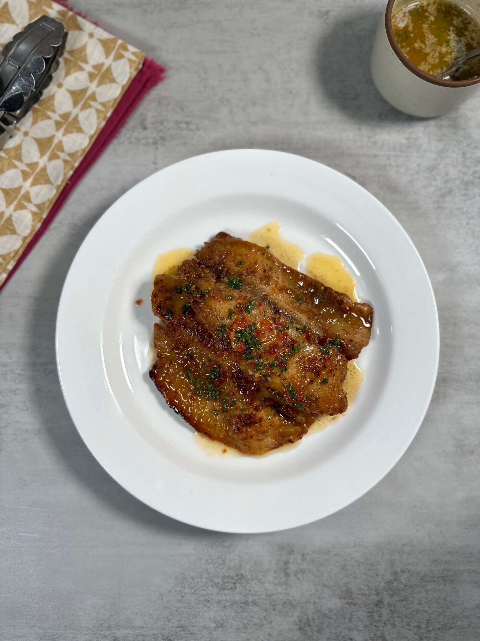 Crispy Fish & Spicy Lemon Butter in a Plate