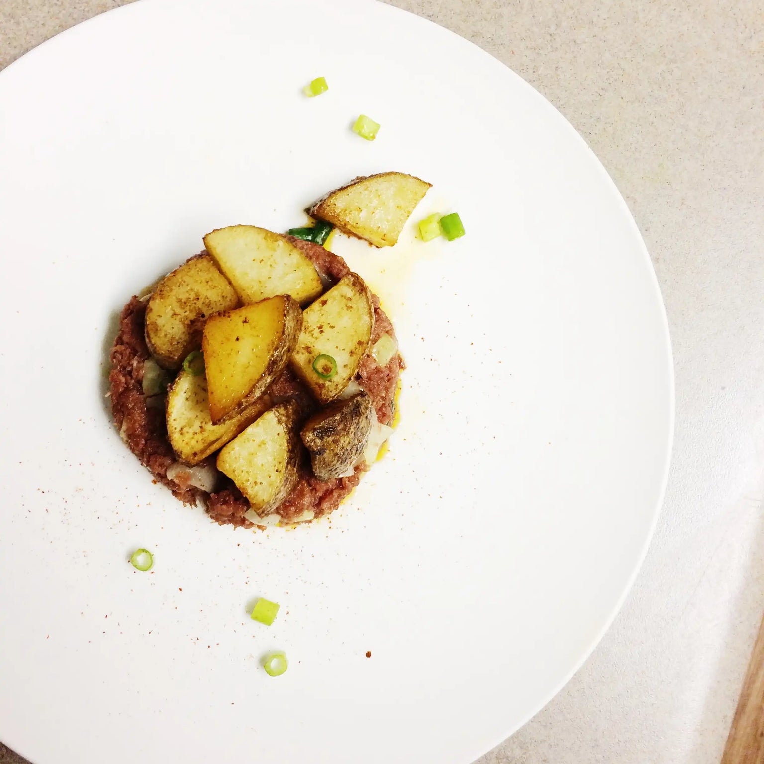 Twenty Minute Dinners – Oven Roasted Potatoes With A Spicy Beef Sauce.