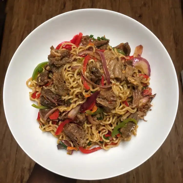 Spicy Asun Noodles in a Bowl - Adun